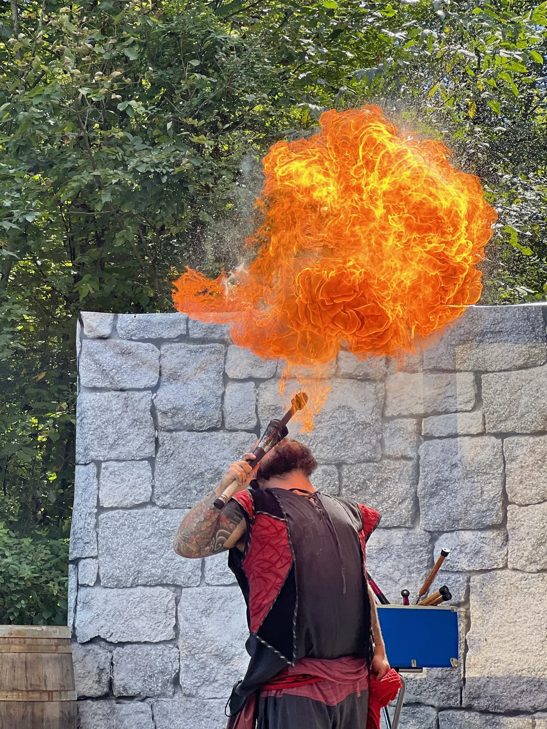 performer breathing fire