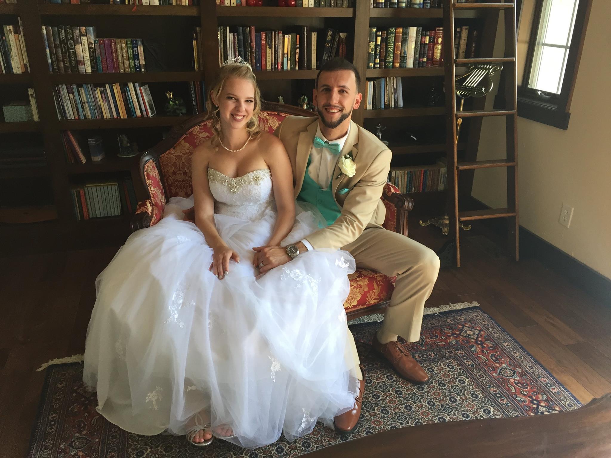 bride and groom in library